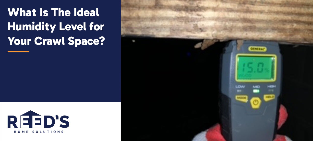 A moisture meter displaying a 15.0% reading is held up to a wooden beam in a crawl space, next to text that reads “What Is the Ideal Humidity Level for Your Crawl Space?” with the Reed’s Home Solutions logo below.