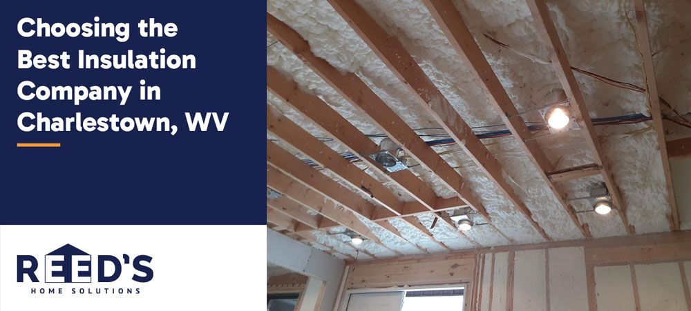 Spray foam insulation applied between exposed ceiling joists in a residential space under construction in Charlestown, WV.