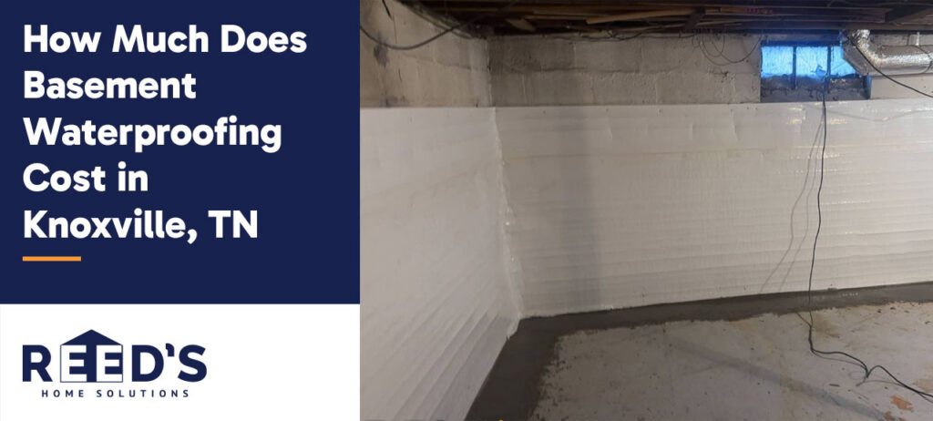 Basement interior with white waterproofing panels installed along concrete walls, featuring a clean sealed perimeter and exposed ceiling in a Knoxville, TN home.