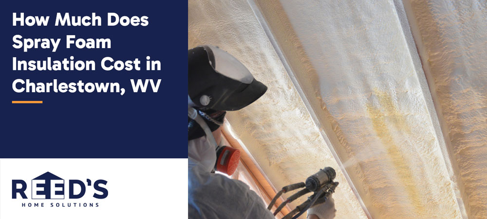 Spray foam insulation being applied between wall studs by a contractor wearing protective gear in a Charlestown, WV home.