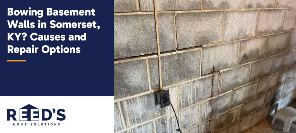 Interior cinder block basement wall in a Somerset, Kentucky home showing visible horizontal cracking, slight wall displacement, and moisture staining, common signs of bowing basement wall problems caused by soil pressure.