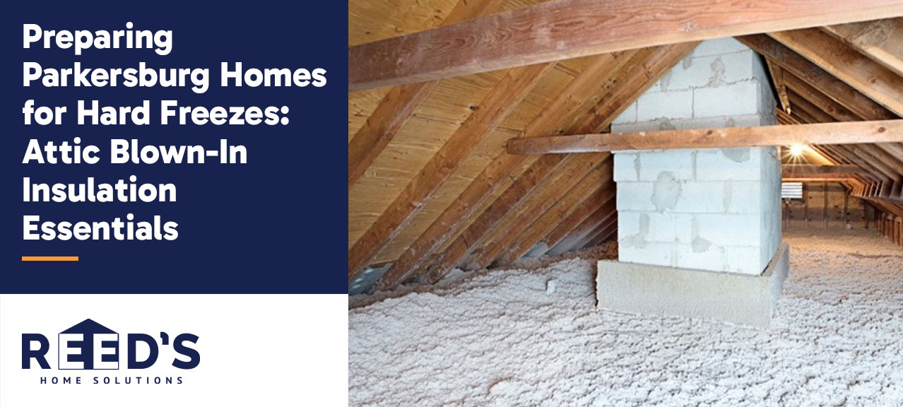 Attic with a thick layer of blown-in insulation surrounding a masonry chimney and exposed wooden roof rafters, helping improve energy efficiency and winter protection in a Parkersburg, West Virginia home.